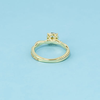 Spiral Round Brilliant Moissanite Engagement Ring Set in 9ct Yellow Gold